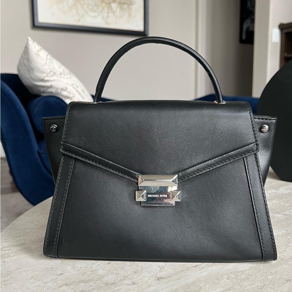 Michael Kors Small Black handbag… like new. No signs of wear!